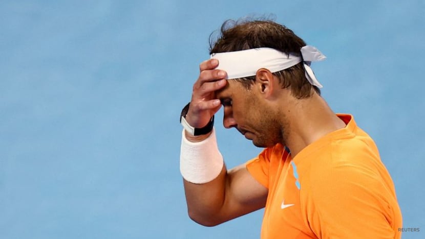 Injured defending champion Nadal bows out of Australian Open Injured defending champion Nadal bows out of Australian Open