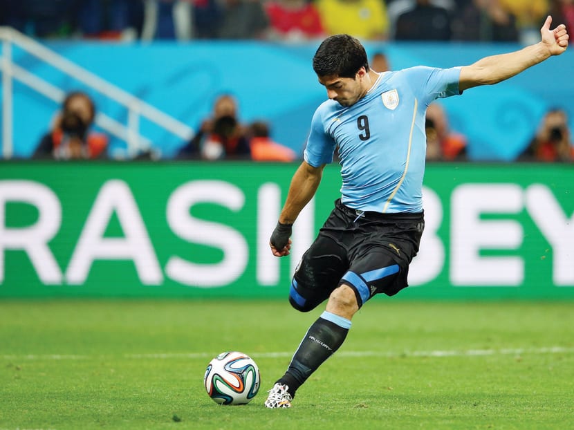 Gerrard is relieved Suarez had not entertained ideas of going to an English rival. 
Photo: Getty Images