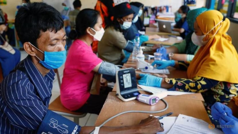 Indonesia reports nearly 9,000 new COVID-19 infections as virus variants cause concern