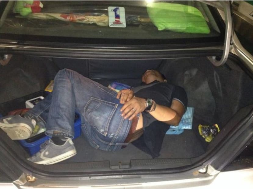 Sofyan Soeb was convicted of trying to depart Singapore illegally via the Woodlands Checkpoint on June 4, 2015. He was found crouching inside the boot of a car. Photo: Immigration & Checkpoints Authority of Singapore Sofyan Soeb was convicted of trying to depart Singapore illegally via the Woodlands Checkpoint on June 4, 2015. He was found crouching inside the boot of a car. Photo: Immigration & Checkpoints Authority of Singapore