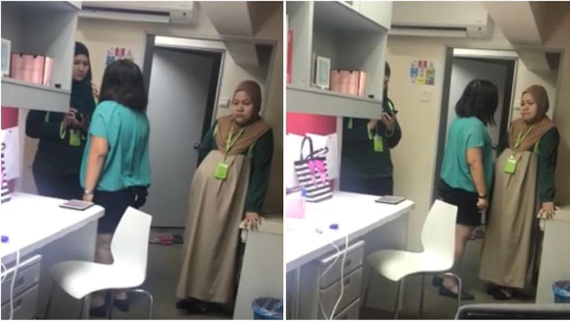 Malaysia telco suspends employee after video emerges of her shouting at pregnant co-worker Malaysia telco suspends employee after video emerges of her shouting at pregnant co-worker