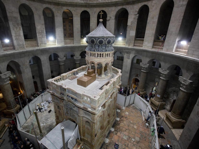The renovated Edicule is seen in the Church of the Holy Sepulchre, traditionally believed to be the site of the crucifixion of Jesus Christ, in Jerusalem's old city Monday, Mar. 20, 2017. A Greek restoration team has completed a historic renovation of the Edicule, the shrine that tradition says houses the cave where Jesus was buried and rose to heaven. Photo: AP