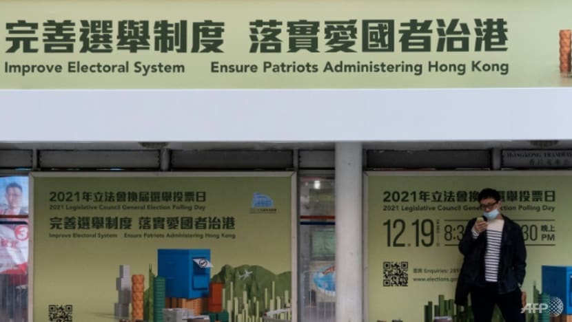 Hong Kong charges four for reposting election boycott calls Hong Kong charges four for reposting election boycott calls