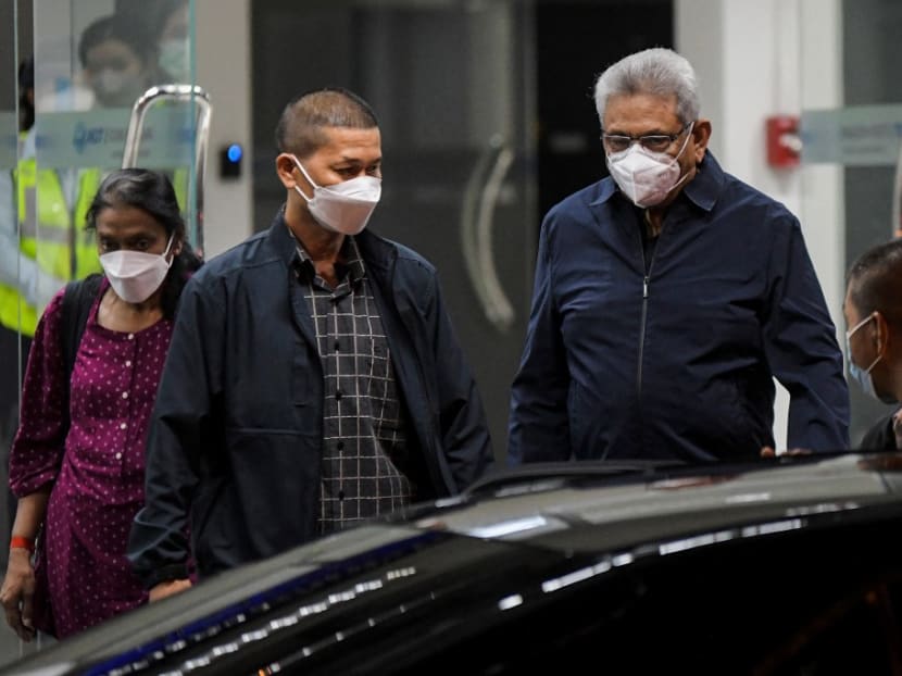 Former Sri Lanka president Gotabaya Rajapaksa walks toward a vehicle upon his arrival at Don Mueang International Airport in Bangkok on Aug 11, 2022. Former Sri Lanka president Gotabaya Rajapaksa walks toward a vehicle upon his arrival at Don Mueang International Airport in Bangkok on Aug 11, 2022.