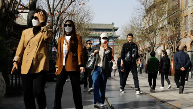 COVID-19 global emergency over but risks remain, says China health official