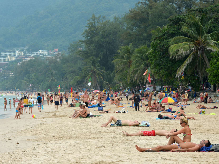 Tourists at a beach in Phuket. AFP file photo