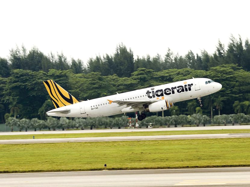 Over the past three years, Tigerair’s report card has mostly been in the red. Revenue fell 10 per cent to S$146.7 million in the second quarter. PHOTO: Tigerair