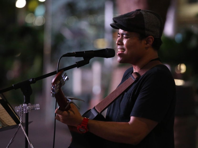 A file photograph of Mr Muhammad Firdaus Osman, one of the buskers who believes it would have been appropriate to offer remuneration to the buskers invited to play at the National Day Parade 2022.