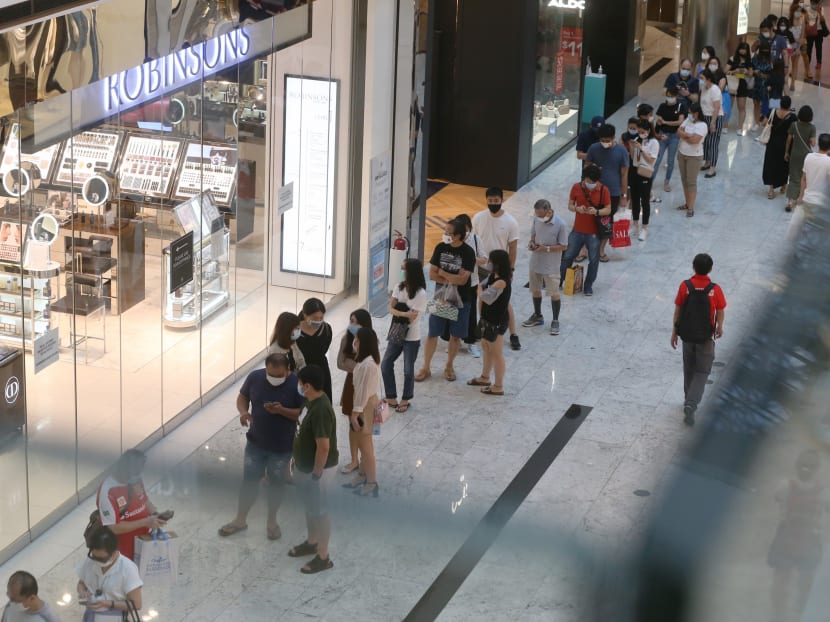 Shoppers waiting to enter the Robinsons store at Raffles City Shopping Centre on Nov 1, 2020, two days after the retailer announced it was closing its remaining two outlets in Singapore. Shoppers waiting to enter the Robinsons store at Raffles City Shopping Centre on Nov 1, 2020, two days after the retailer announced it was closing its remaining two outlets in Singapore.