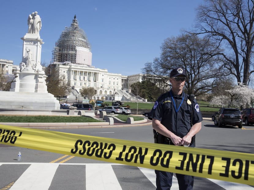 Police guard the US Capitol grounds after a shooting took place, in Washington on April 11, 2015.  Photo: Reuters