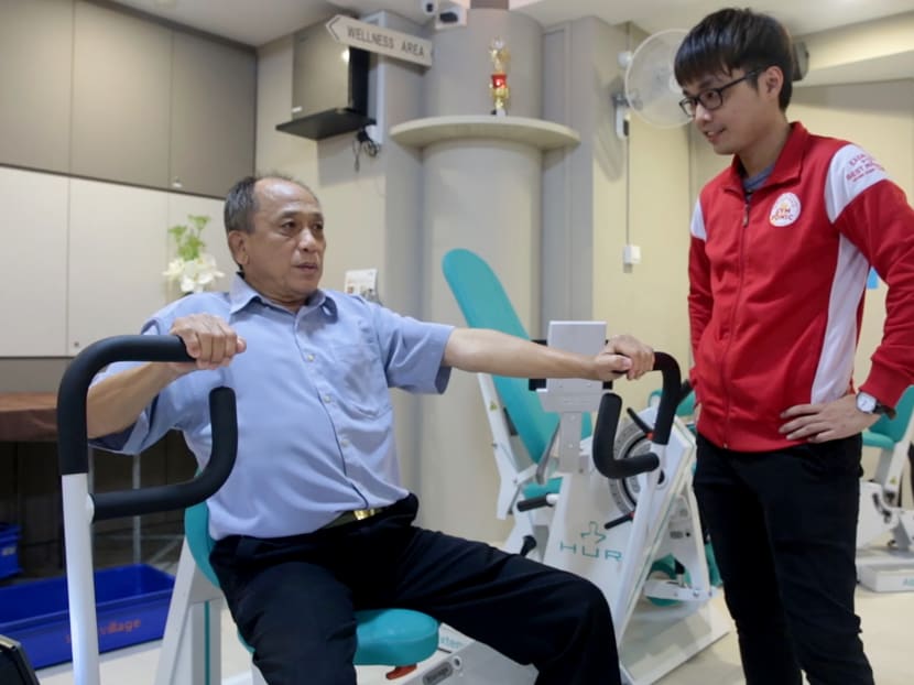 Mr Huang Kee Sang, 67, uses a Gym Tonic strength training machine. Photo: Jason Quah/TODAY