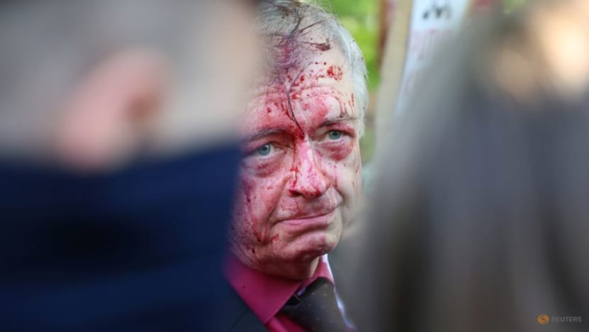 Russian envoy to Poland doused in red by anti-war protesters Russian envoy to Poland doused in red by anti-war protesters