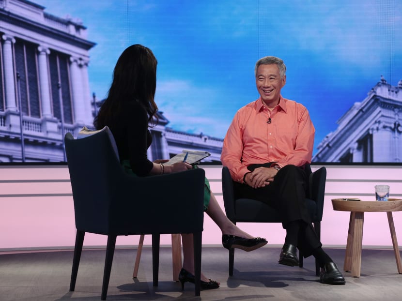 Prime Minister Lee Hsien Loong (right)  during his interview. Photo: Jason Quah