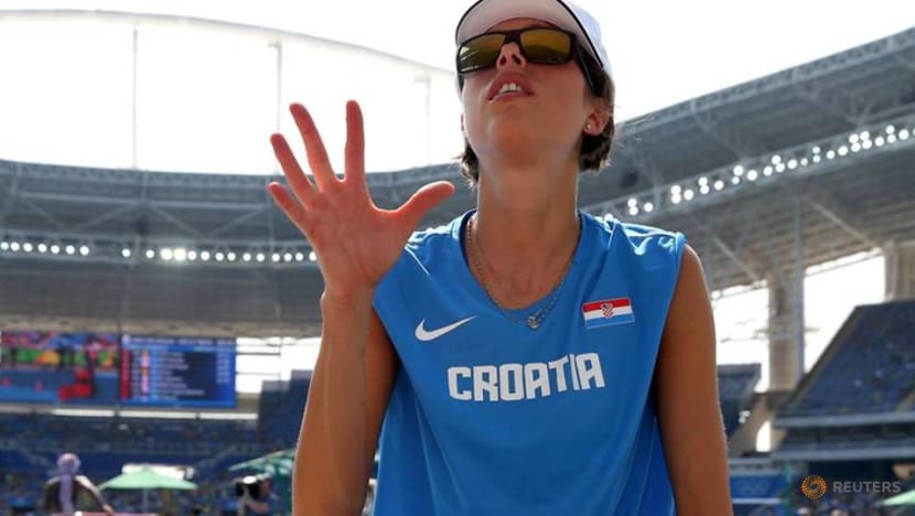 Double high jump world champion Vlasic retires Double high jump world champion Vlasic retires