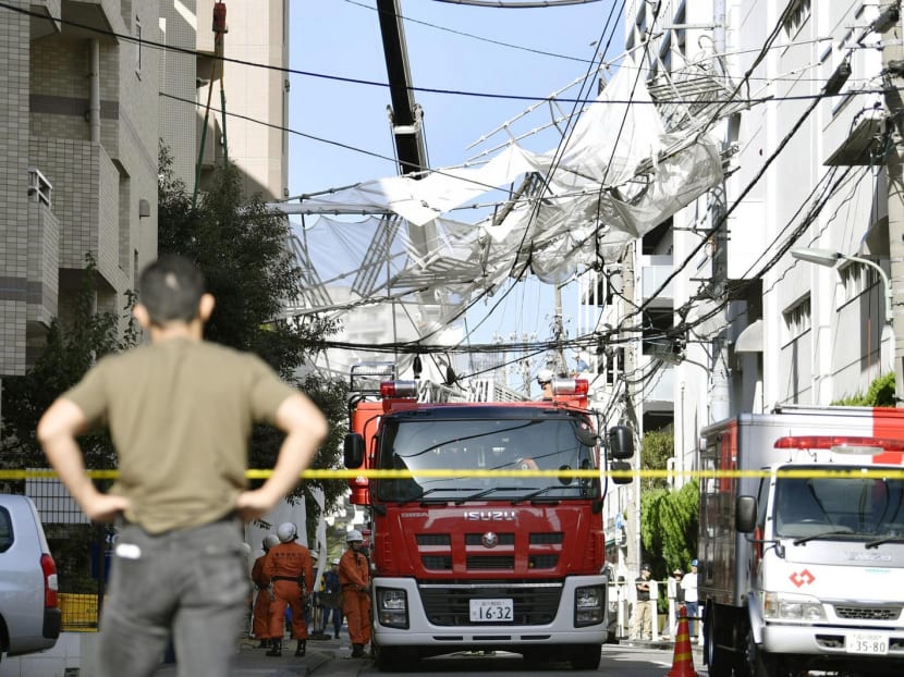 A collapsed scaffolding in Tokyo’s Shinagawa Ward yesterday, a result of strong winds brought by Typhoon Talim. Photo: Kyodo News