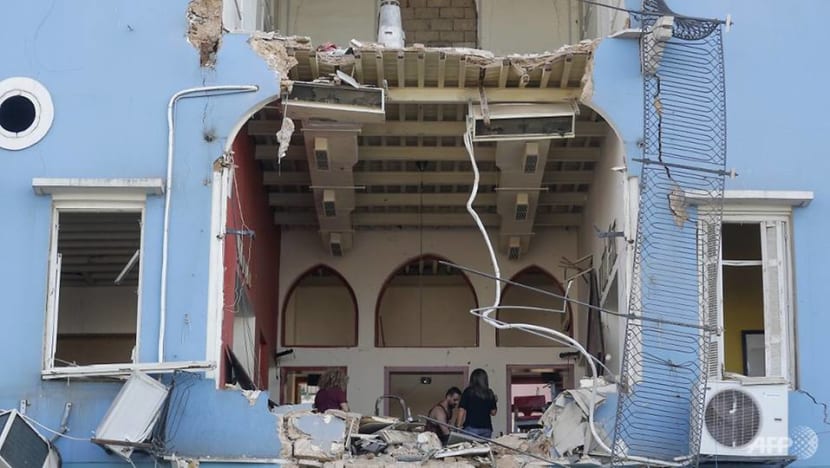 Dazed and wounded, Lebanese emerge from Beirut blast angry at leaders Dazed and wounded, Lebanese emerge from Beirut blast angry at leaders