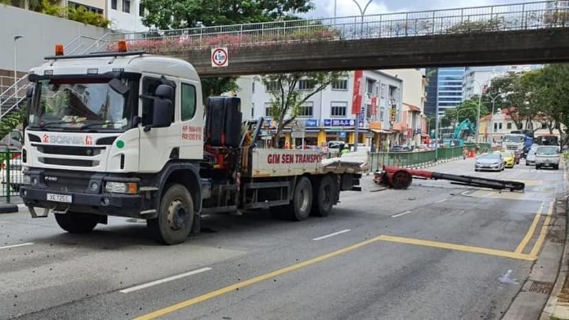 Driver arrested after mounted crane falls off lorry along Balestier Road Driver arrested after mounted crane falls off lorry along Balestier Road