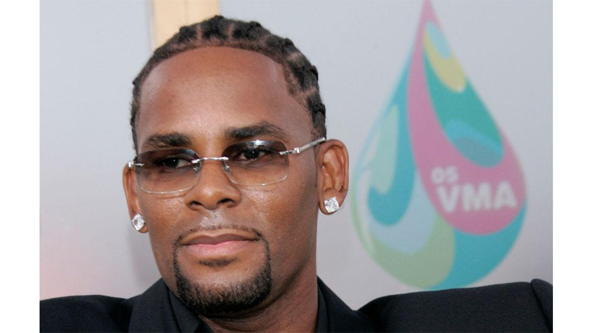 R. Kelly arrested over child support - 8days
