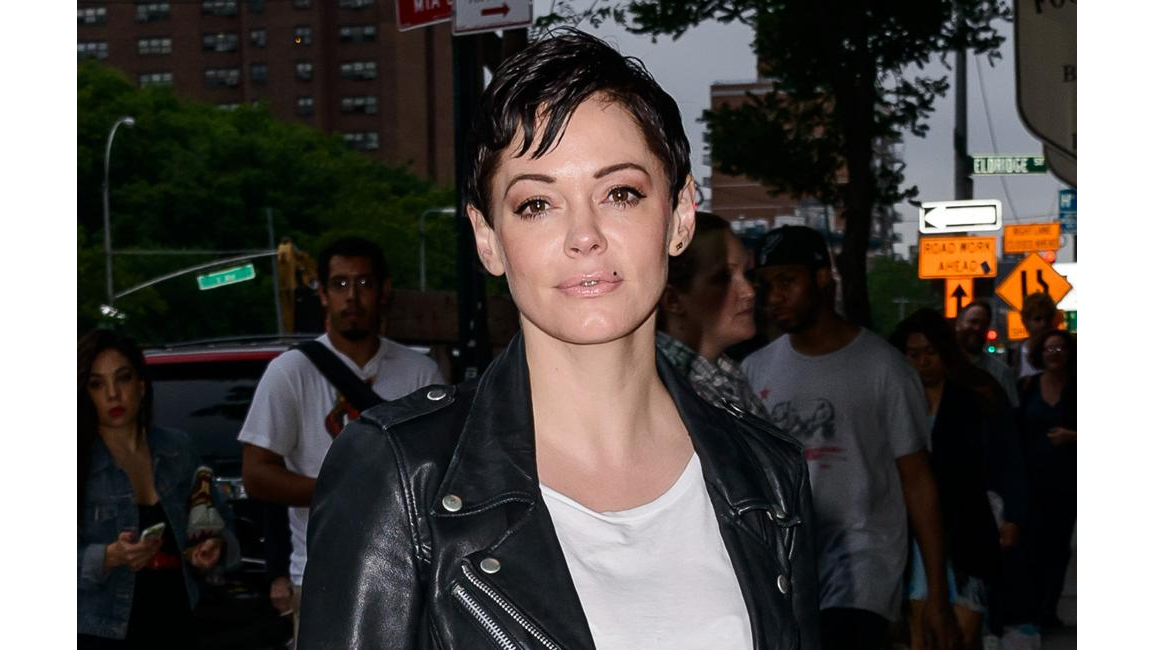 Rose McGowan hands herself in to police 8days