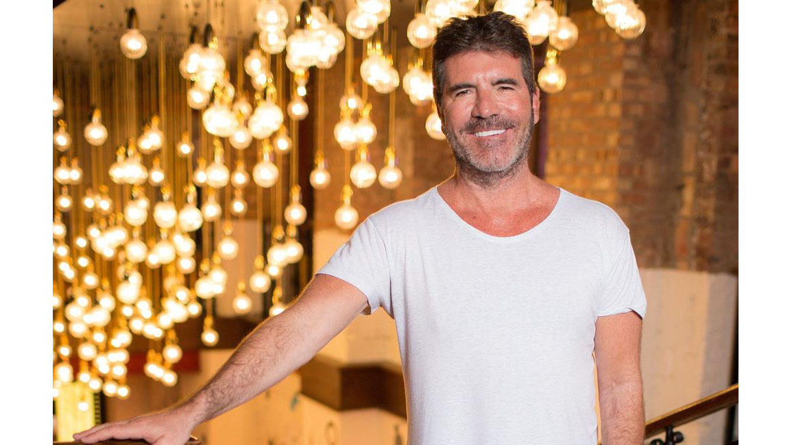 Simon Cowell's fatherly bond 8days