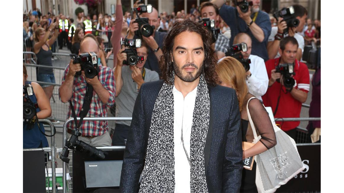 Russell Brand is a 'devoted father' 8 Days