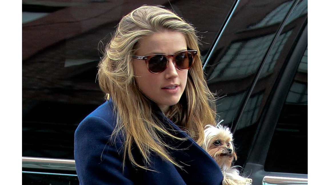 Amber Heard's billionaire boyfriend 'very attentive' to her 8days