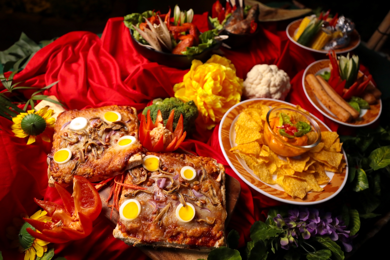 A barbecue feast awaits at dinnertime, complete with nasi lemak pizza and nachos.