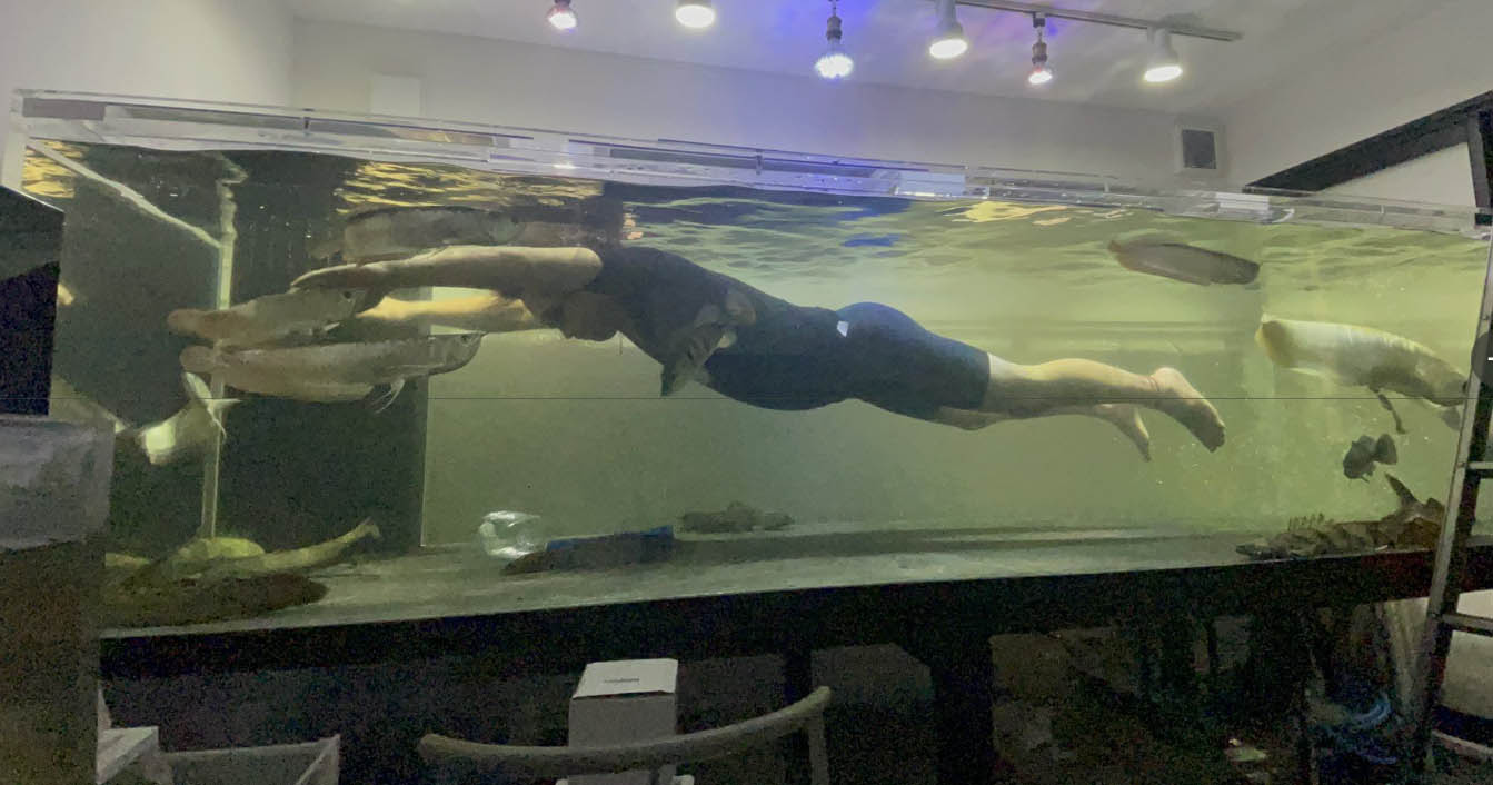 Man In Japan Has 3m-Long Aquarium In His House That He Swims In
