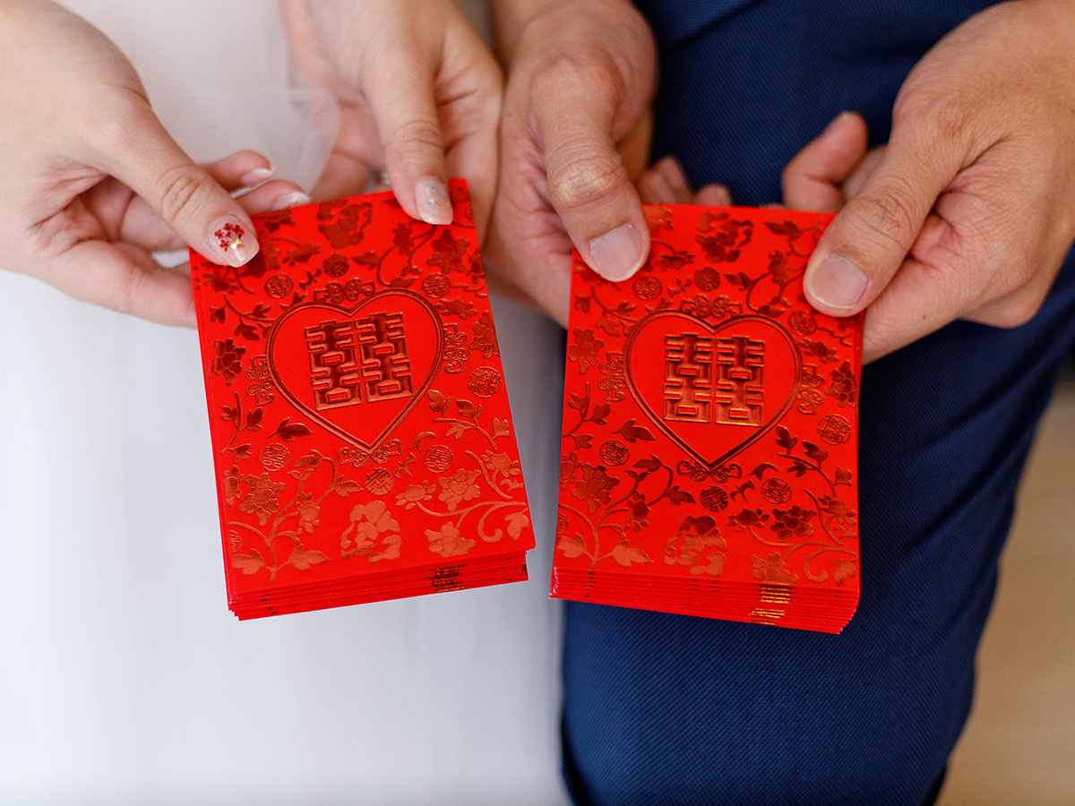 Man charged with stealing red packet box from wedding reception at Raffles Hotel