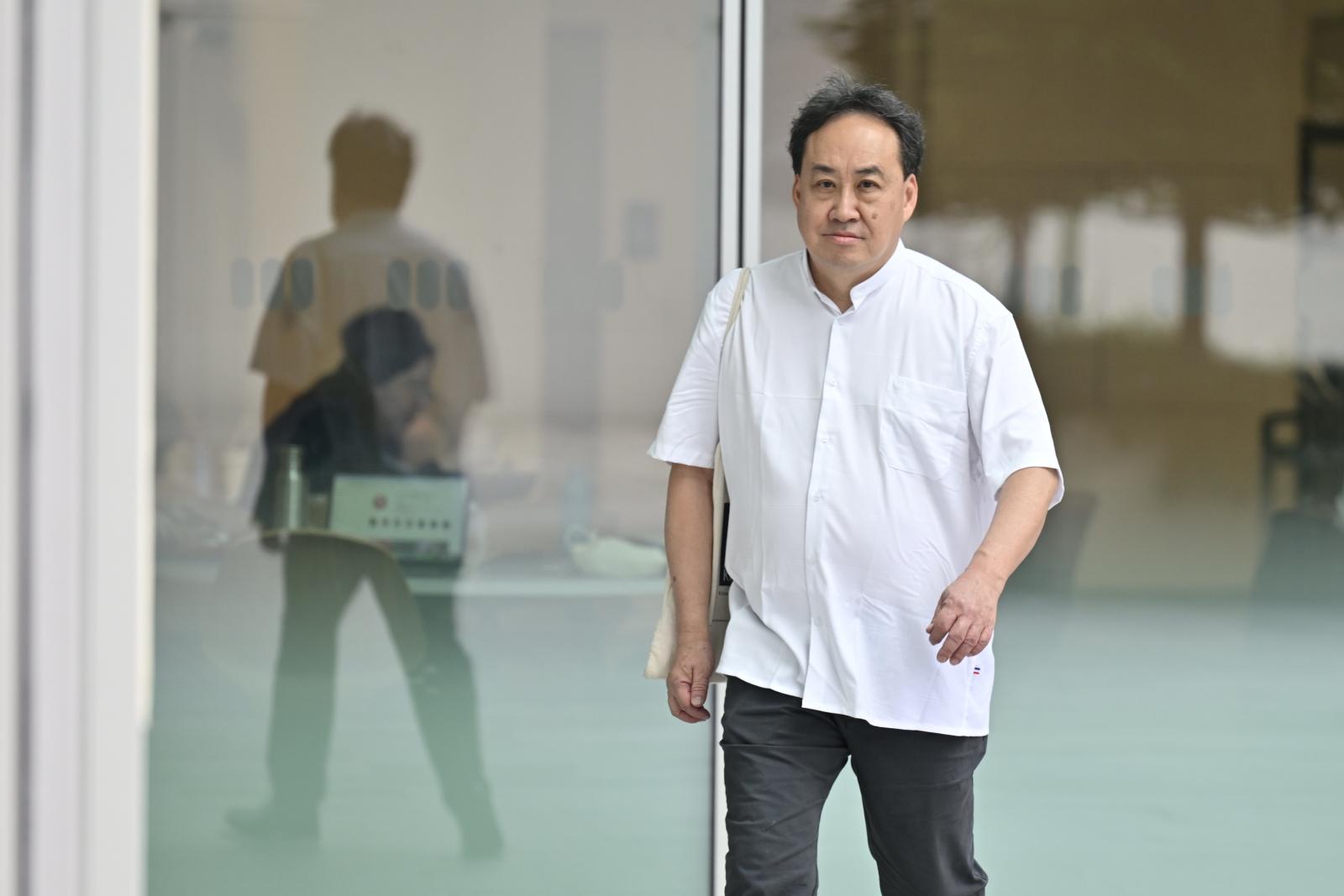 Two men charged over alleged arrangements for Lim Tean to leave Singapore illegally