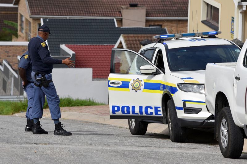  12 people, including 3 children, killed in South Africa hostel shooting