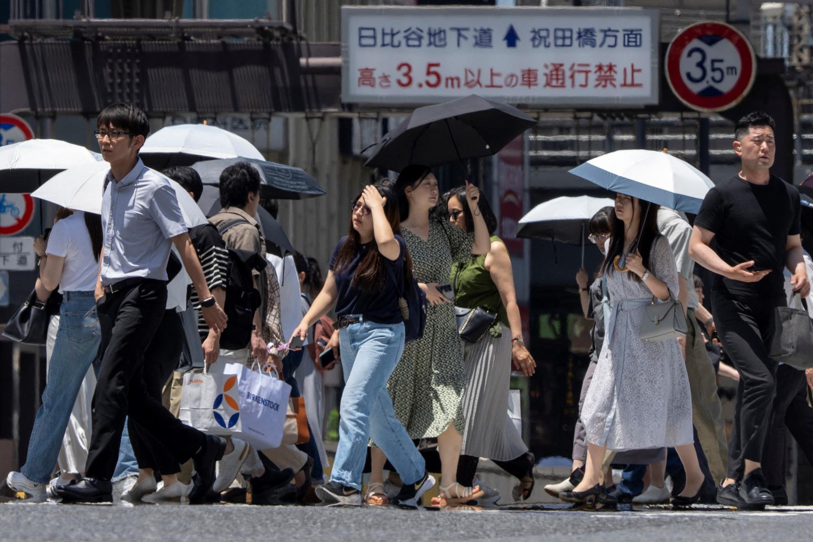 Japan braces for more quakes, authorities dismiss doomsday hype