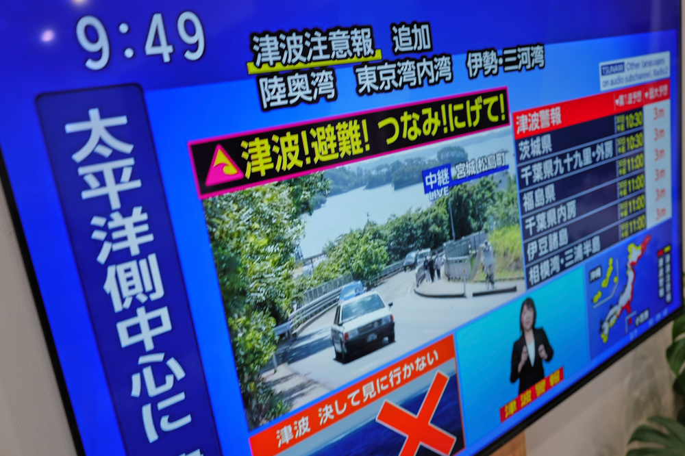 Japan issues tsunami warning after huge quake off Russia sparks alerts around the Pacific