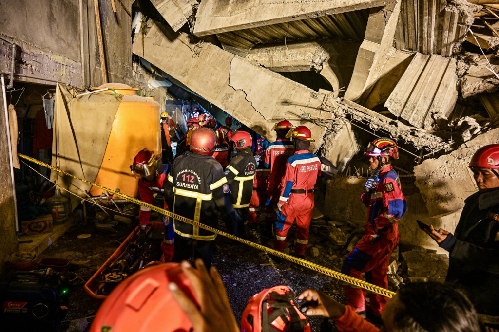 Indonesian rescuers hunt 38 missing after Islamic school collapse kills three, injures nearly 80