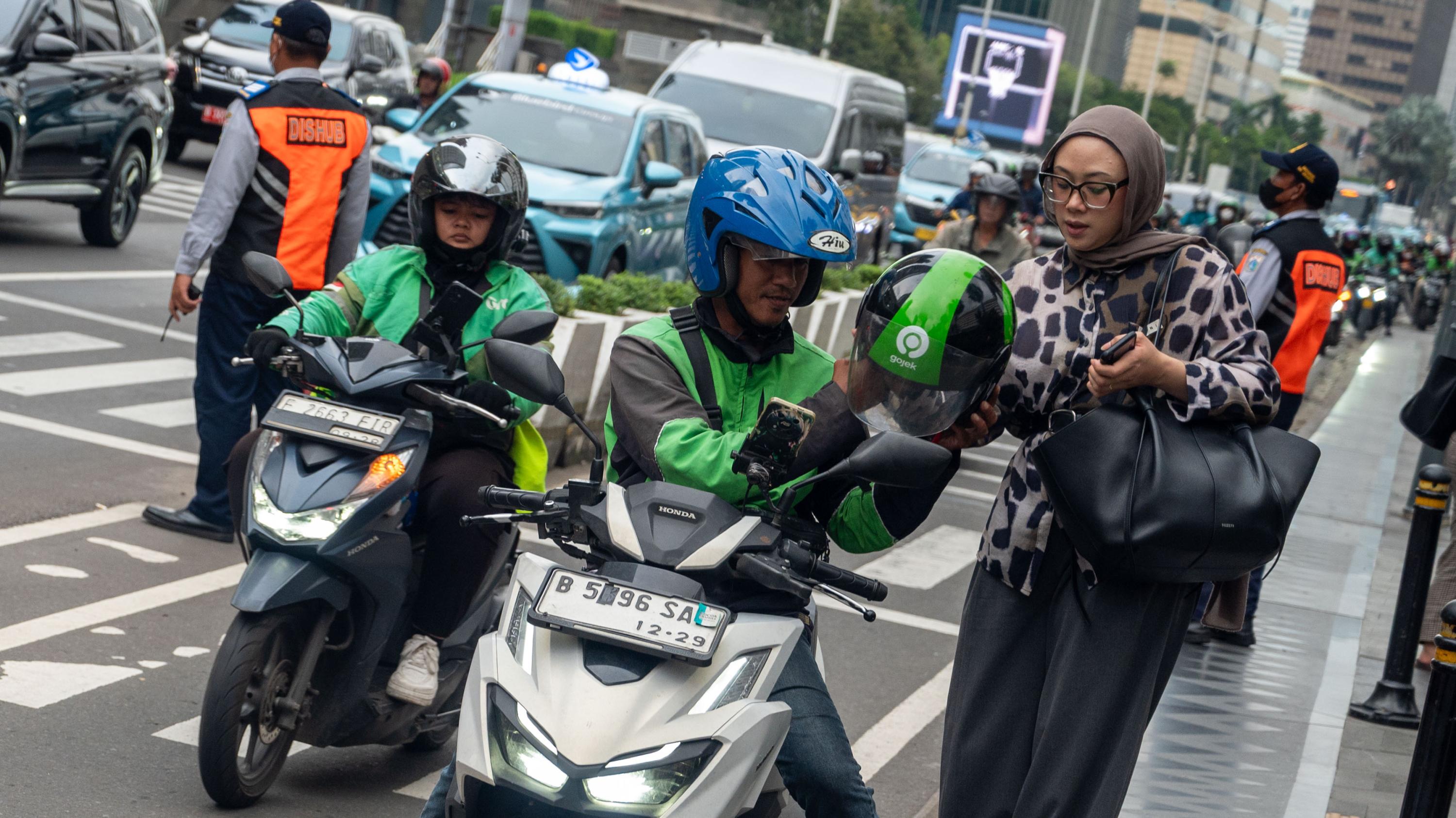 What’s fuelling Grab-GoTo’s merger talk in Indonesia - financial losses, politics or other factors?