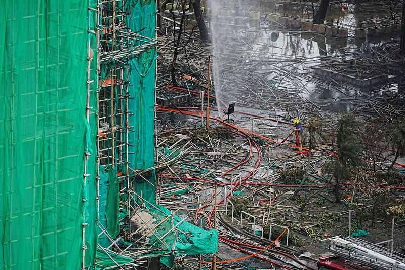 Hong Kong orders scaffold netting to be removed at over 200 sites in wake of inferno