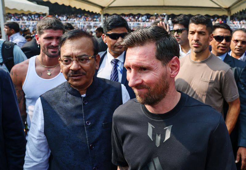 India fans throw objects onto field after Messi makes brief visit