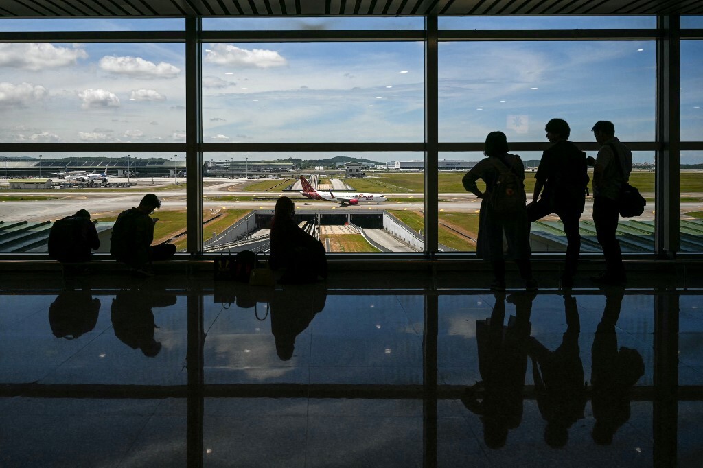 Malaysia Airports says global passenger processing system 'fully restored' after temporary disruption