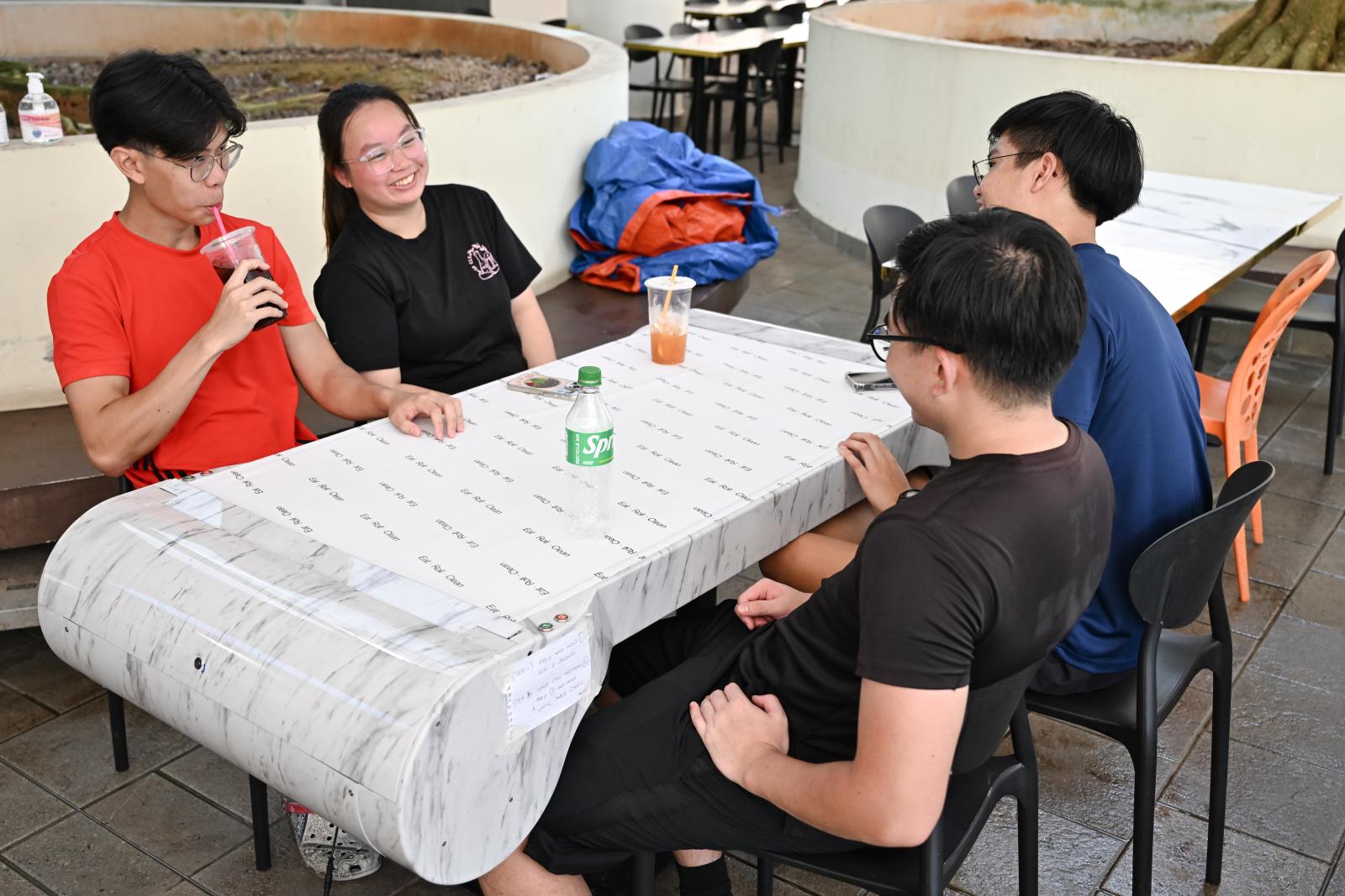 A table that cleans itself? Food centre operators turn to tech as cleaners become harder to find