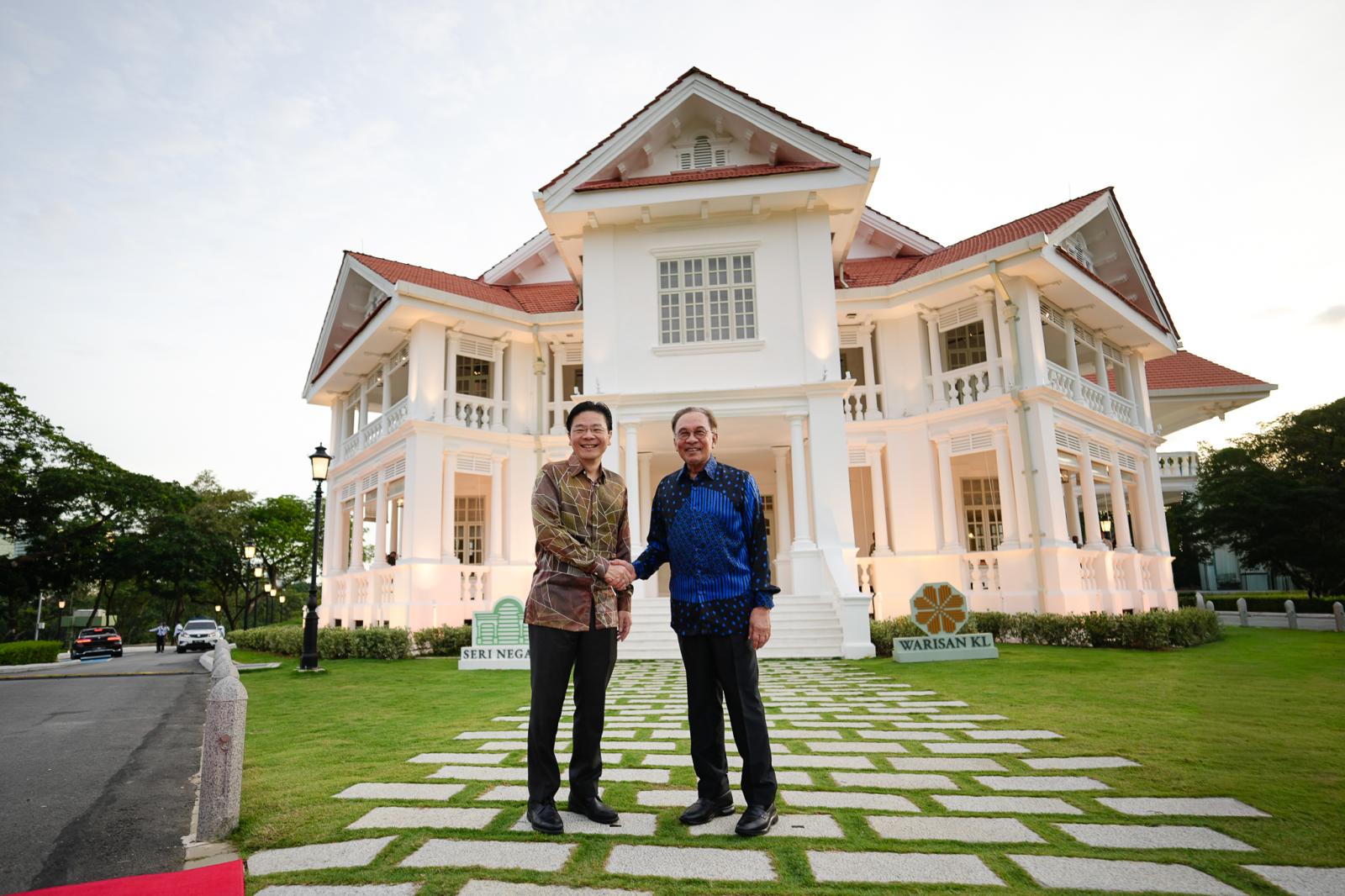 Singapore PM Wong, Malaysia’s Anwar pledge to strengthen ties, resolve outstanding issues after ‘buka puasa’