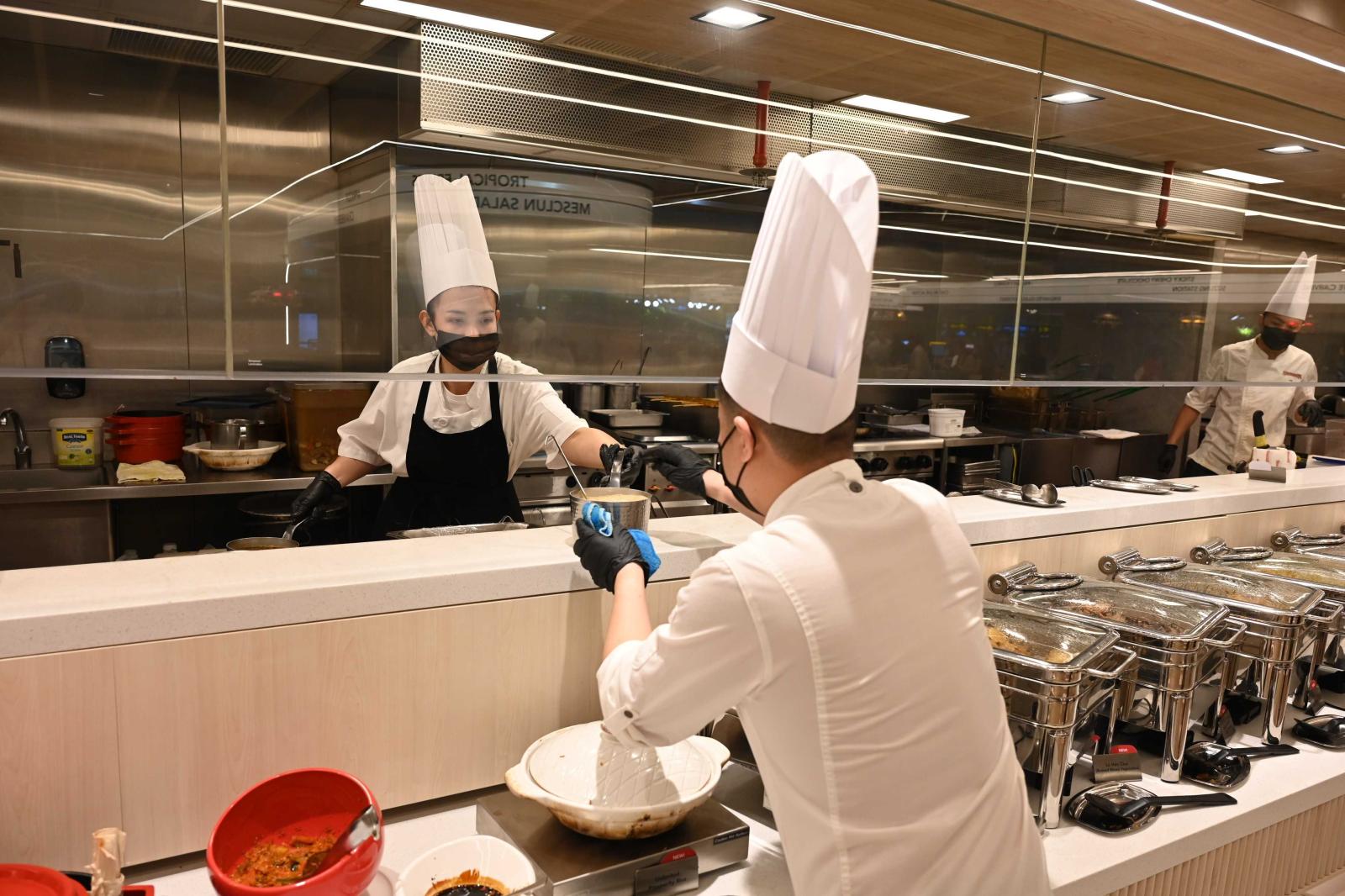 Food services workers to receive further pay increases under Progressive Wage Model