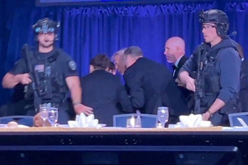 As it happened: Trump says 'lone wolf' shooter at correspondents' dinner had multiple weapons