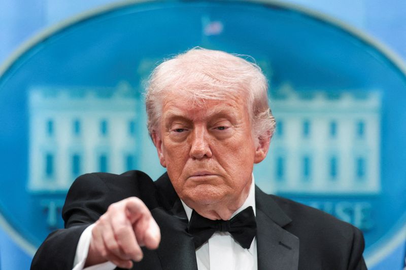 Trump insists China trip will go on as planned; analysts say leaders' summit crucial to manage risks