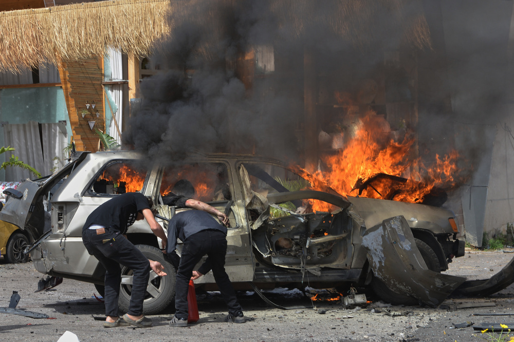 Israel hammers Lebanon, killing 12 in strikes on cars 
