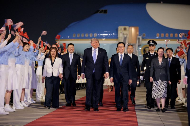 Trump lands in China ahead of high-stakes summit with Xi