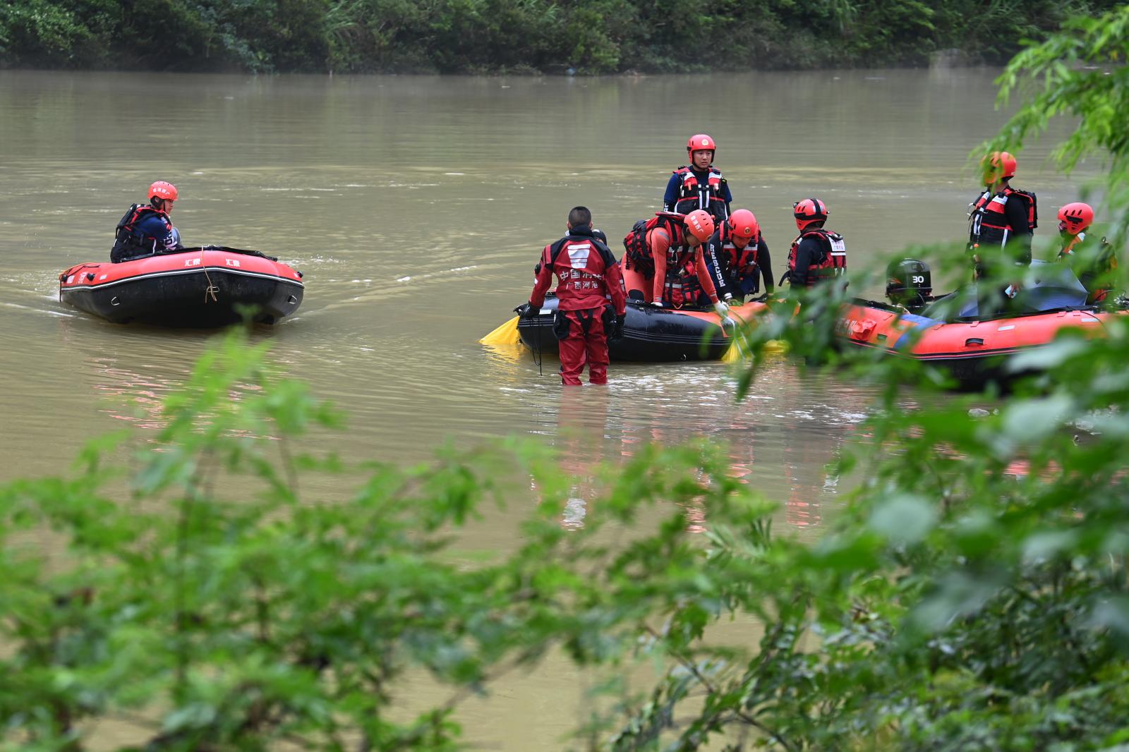 At least nine killed in southwest China after truck falls into river in heavy rain
