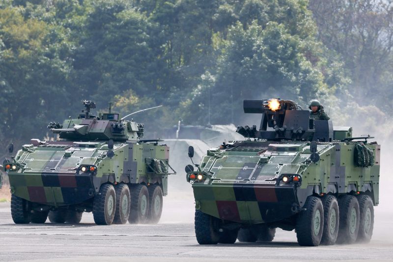 Hundreds rally in Taipei for defence spending after parliament cuts funds