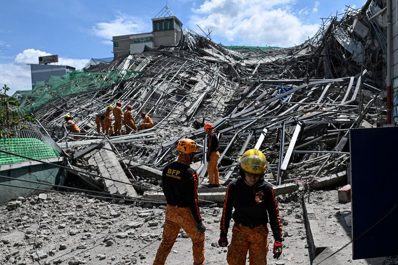 Search ongoing for over 20 trapped after Philippines building collapse