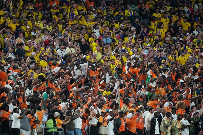 Feeling priced out of tickets to watch their teams at the World Cup, fans opt for cheaper matches