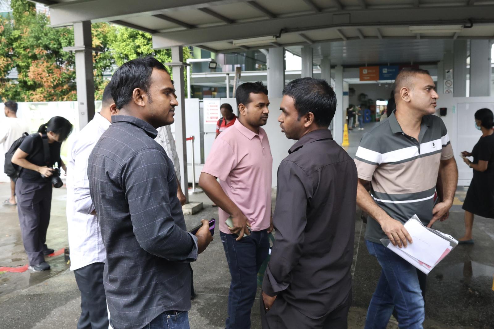 MOM investigating two firms after more than 100 migrant workers seek help over unpaid wages, housing issues